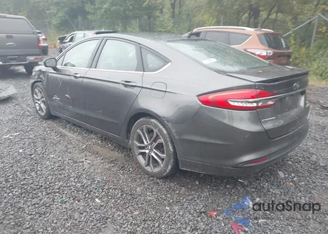 2017 Ford Fusion Hybrid Se z USA, uszkodzony, nr VIN 3FA6P0LUXHR286039